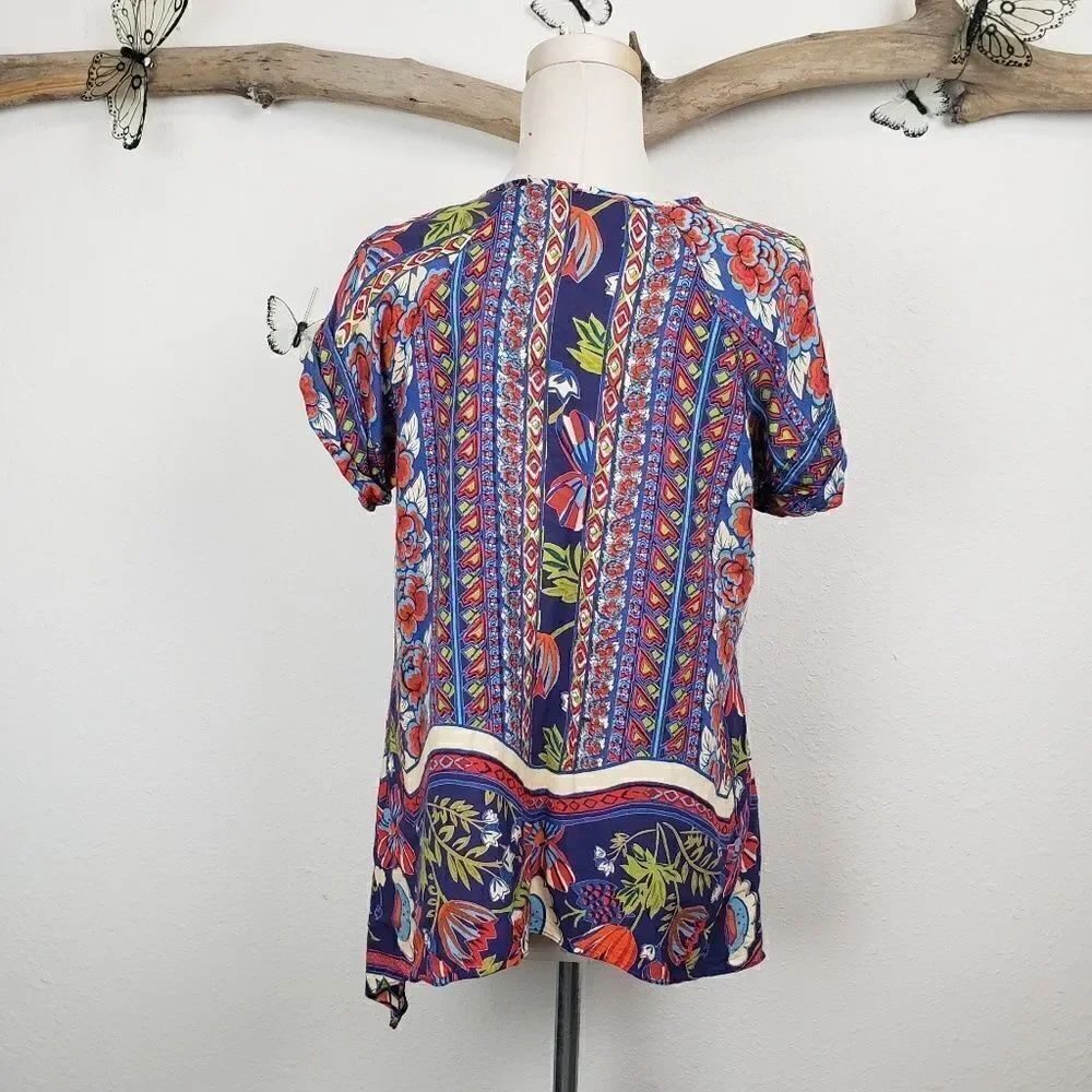Lola P. Multicolored cuffed short sleeve blouse